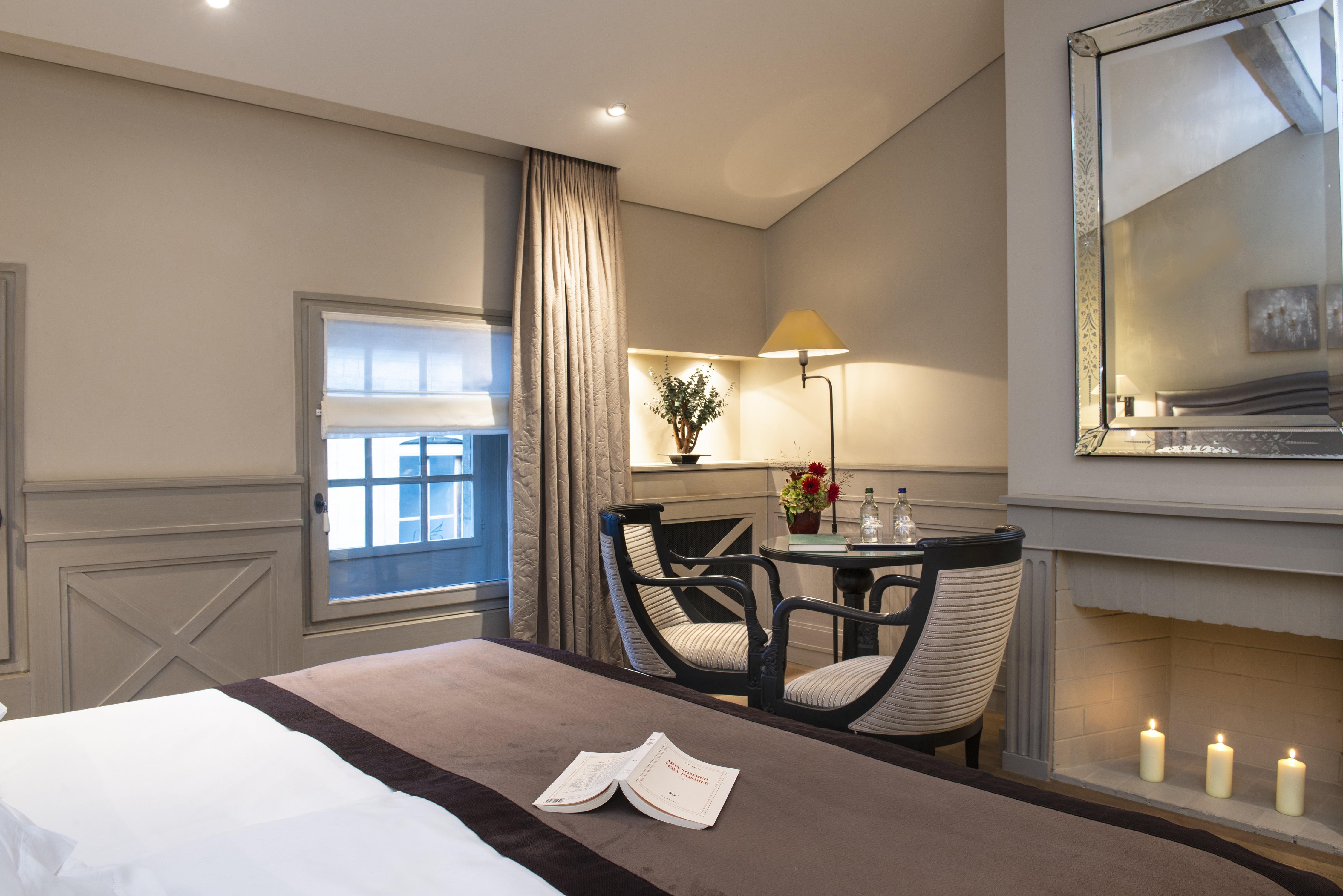 ホテル レ ザミュール ジュネーブ エクステリア 写真 A room at the hotel